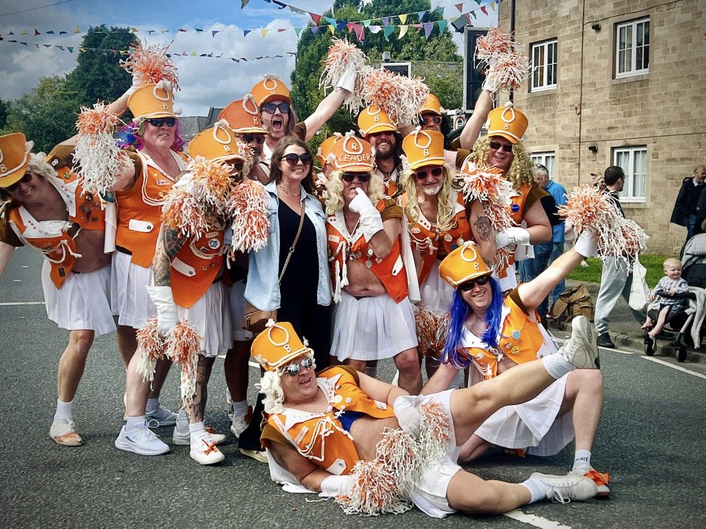 Billarette's stopping for a photo in the carnival parade